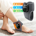 Dark gray heated ankle brace with handheld control unit showing green indicator lights