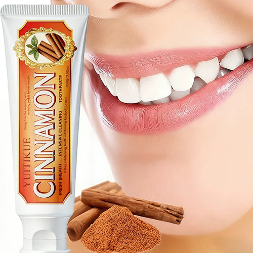 Cinnamon toothpaste tube with cinnamon sticks and powder next to smile and teeth