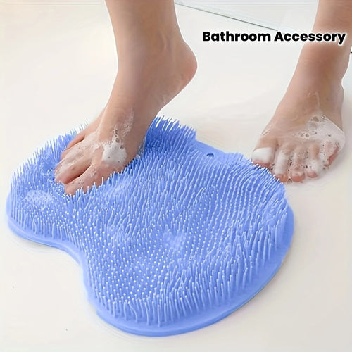 Blue anti-slip shower foot scrubber mat with raised massage spikes under both feet