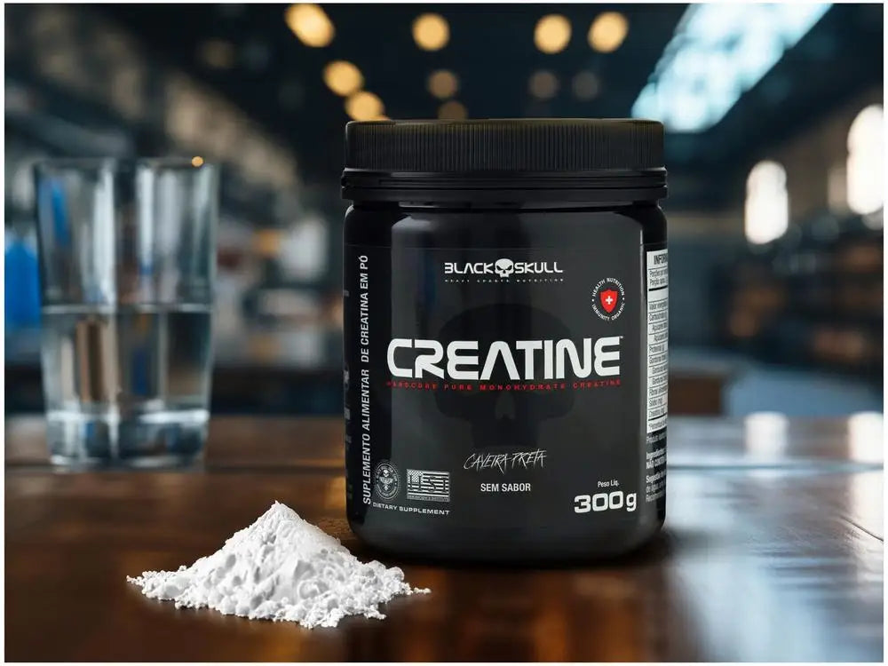Black creatine powder jar with scoop of white powder beside it, 300g