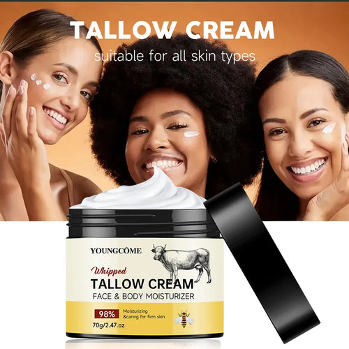 Tallow cream jar with white whipped cream swirl on top, black lid and gold band label