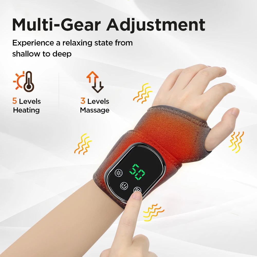 Heated wrist massager brace with green-lit LCD and adjustable gray strap