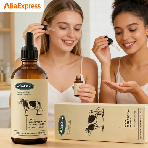 Amber glass serum bottle with black dropper and cardboard box